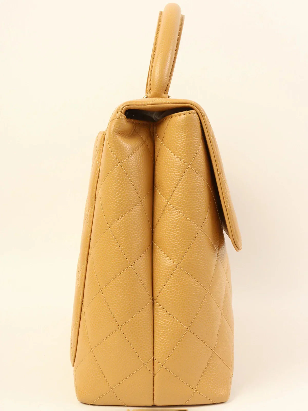 Chanel Around Made Caviar Skin Turn-Lock Manico Beige